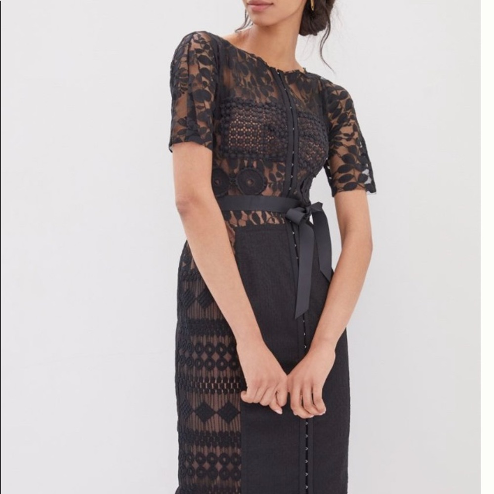 Flattering dressy black lace dress with nude slip.